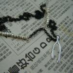 Sterling silver wishbone charm on oxidized black chain with Thai silver nugget accents.  SOLD