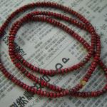 Long red matte czech glass necklace can be worn as a single or double strand necklace or as a five strand wrap bracelet.